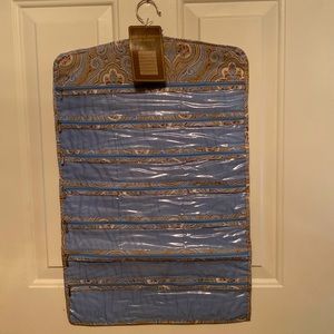 NWT Hanging Jewelry Organizer- 7 Clear zippered pockets - double sided.